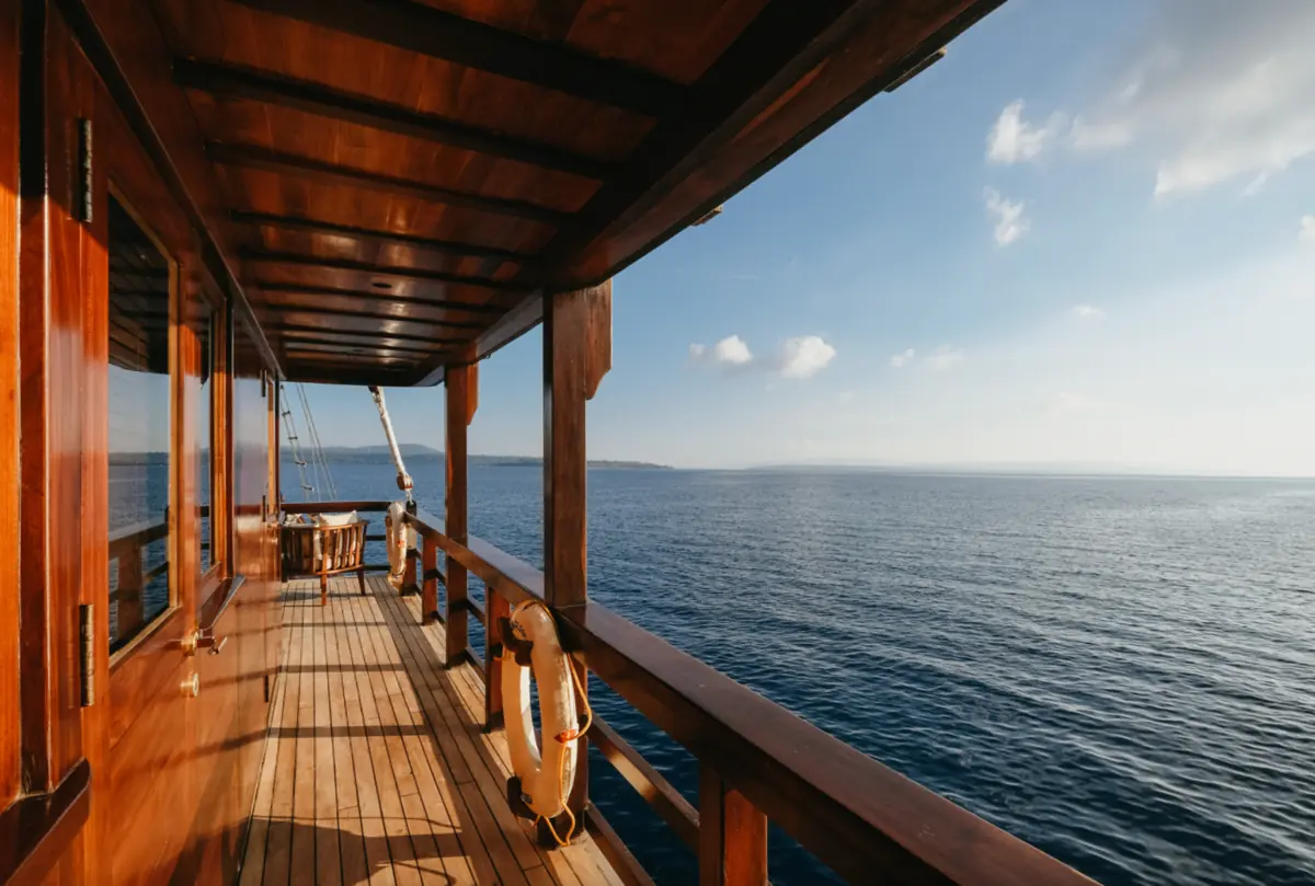 Wooden walkway on a luxury phinisi yacht in Komodo