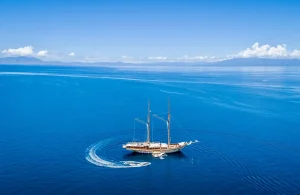 Aerial view of luxury phinisi yacht in Komodo