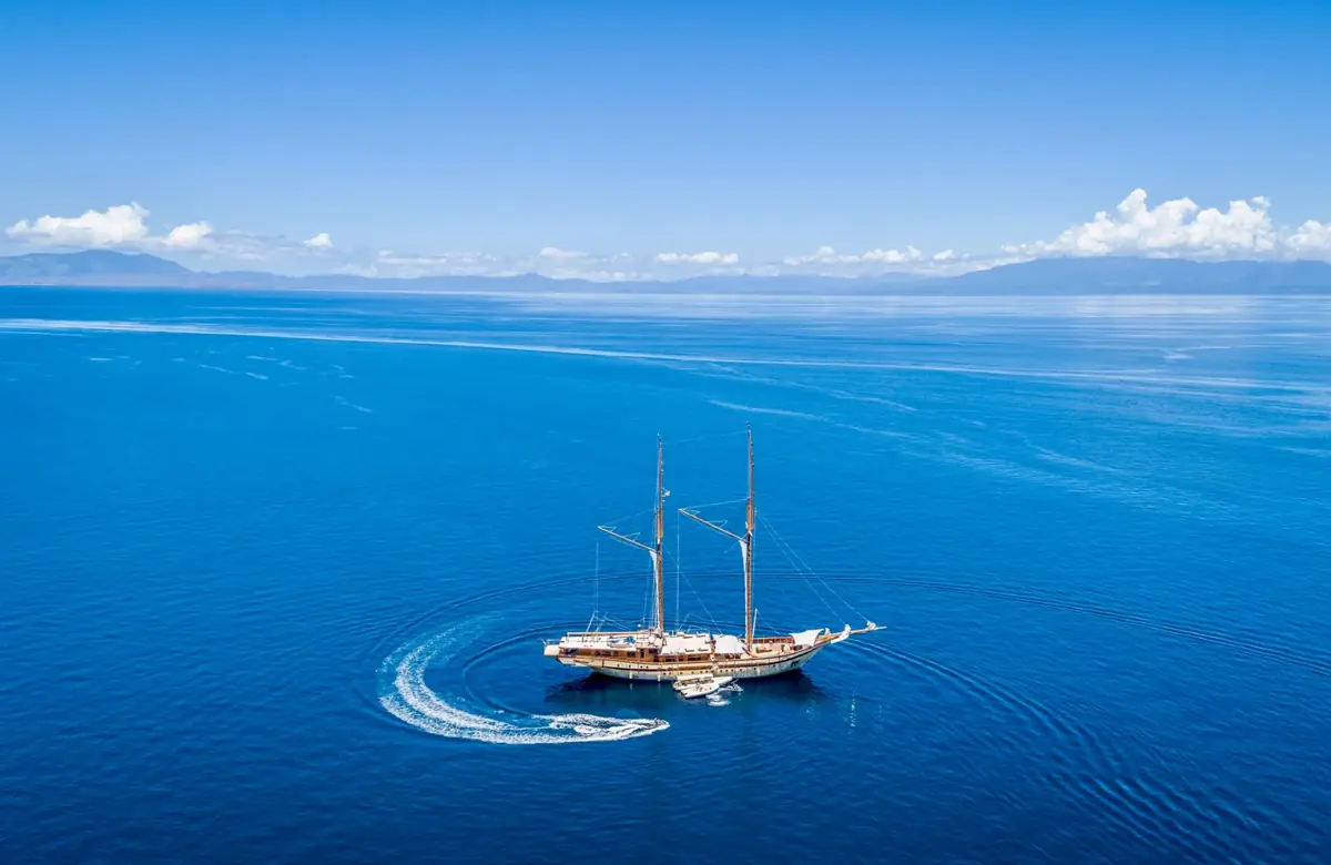 Aerial view of luxury phinisi yacht in Komodo