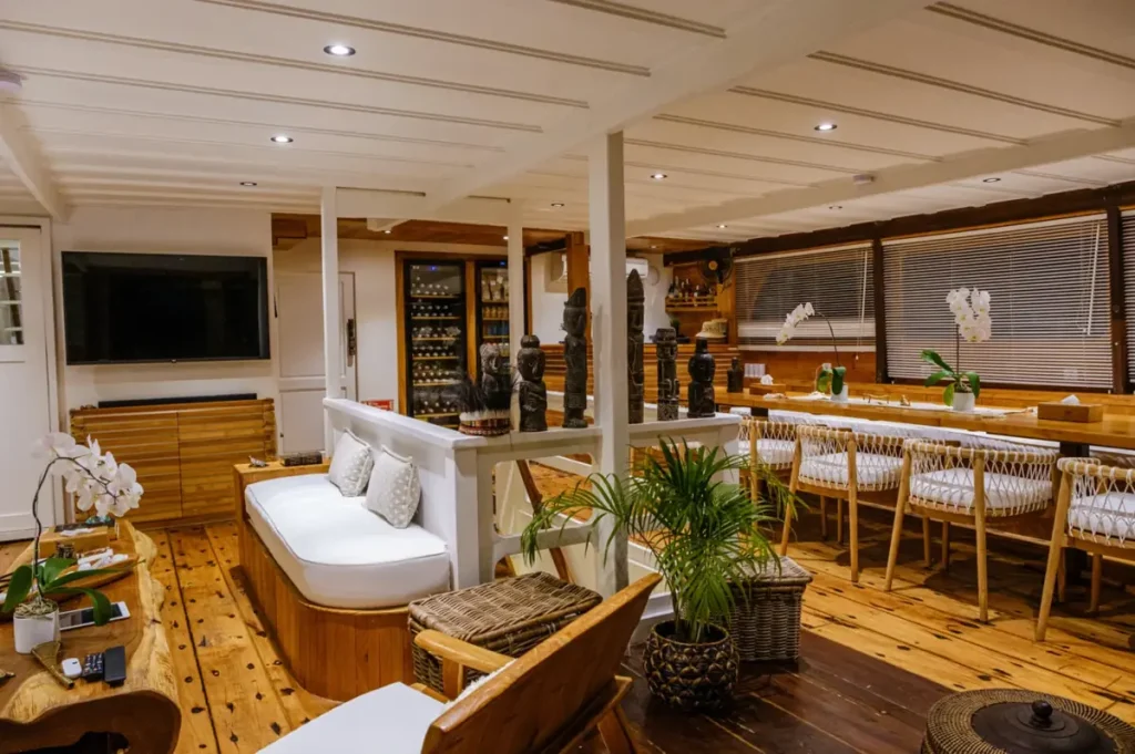 Stylish main deck indoor lounge on a luxury phinisi yacht