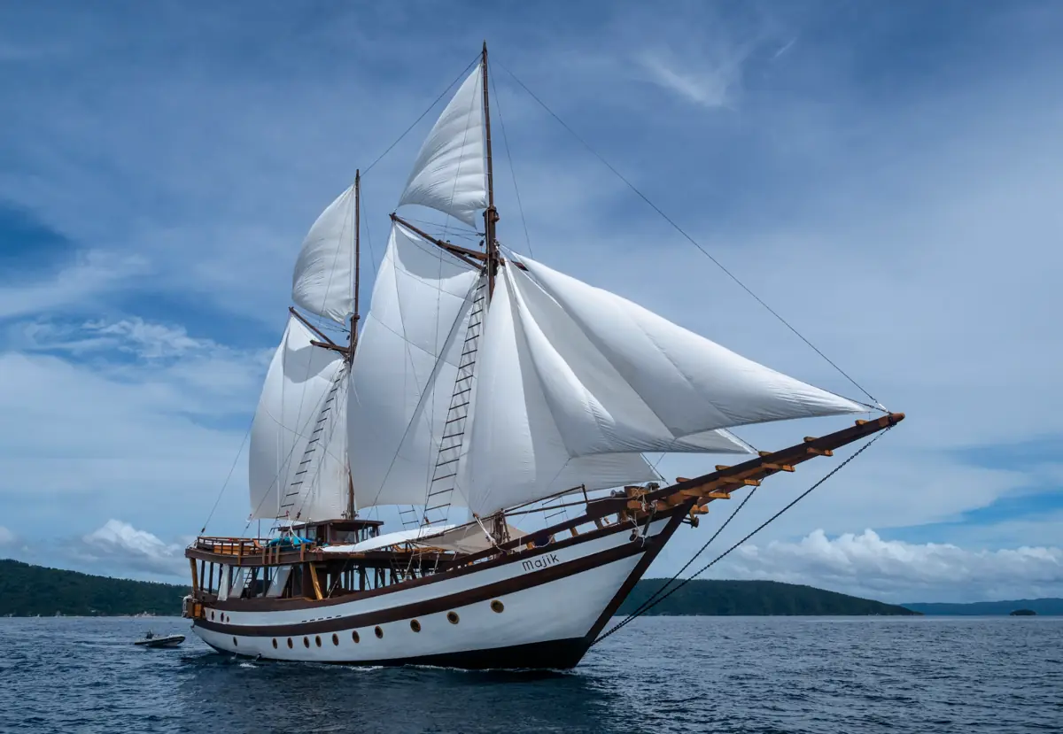 Majik liveaboard yacht sailing through Komodo